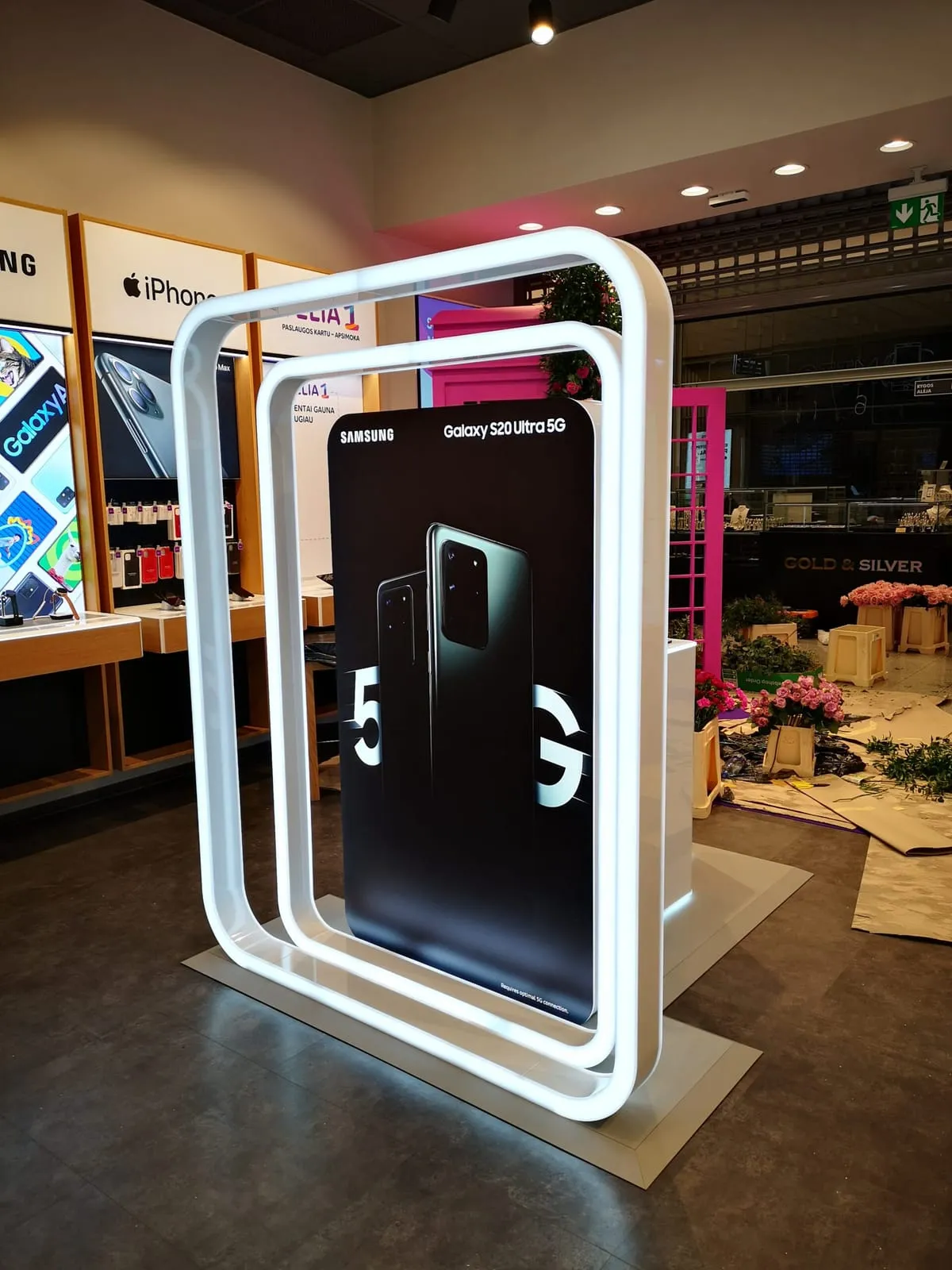 Illuminated Samsung Galaxy S20 display with white LED frames in a retail store