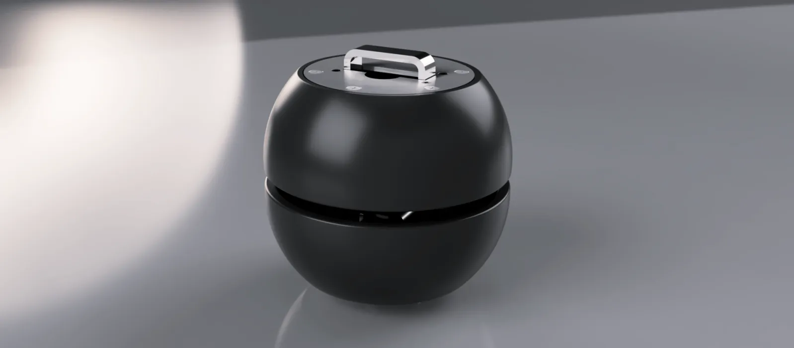 Render of the spherical IREX Fitness device with a carry handle